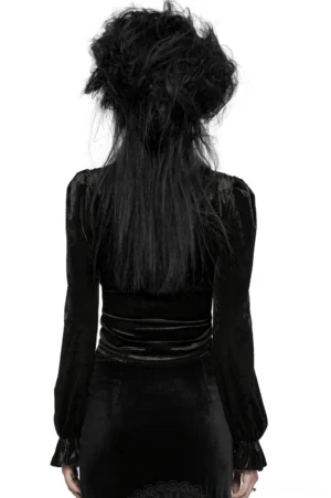 Black velvet gothic blouse back view showcasing tailored fit, puff sleeves, and structural silhouette on model