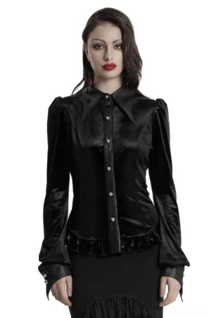 Black velvet gothic blouse with bat wing collar worn by female model front view studio photography