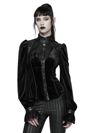 Black velvet gothic blouse front view on model - featuring ruffled stand collar, button placket, embroidered chest detail, and dramatic puffed sleeves