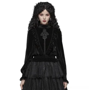 Black velvet Gothic blouse with dramatic ruffle collar and lace trim worn by model with curly black hair in front view, showcasing embroidered front and shirred waist details