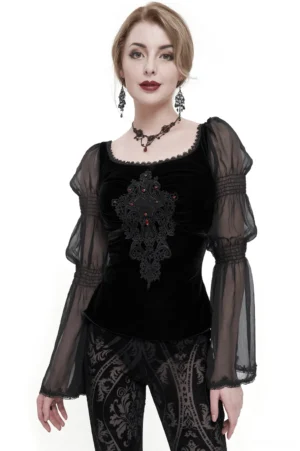 Black velvet gothic blouse with sheer mesh bell sleeves and lace chest appliqué on female model wearing full outfit
