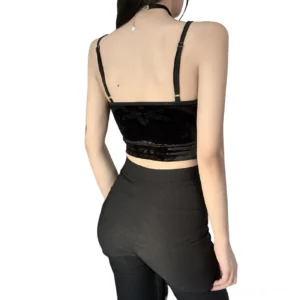 Back view of black gothic velvet crop cami top with adjustable spaghetti straps and lace back neck trim on model