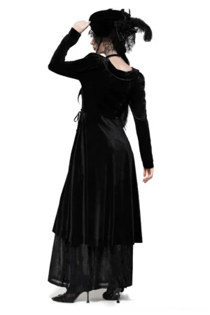 Black velvet gothic dress back view showing lace-up corset detail and flowing mesh ruffle layers on model