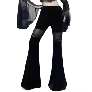 Black velvet flare pants with mesh thigh inserts and studded trims, front view on model showcasing high-waisted gothic fit