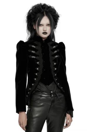 Women's black velvet gothic jacket with stand collar and ornate metal buttons, front view on model