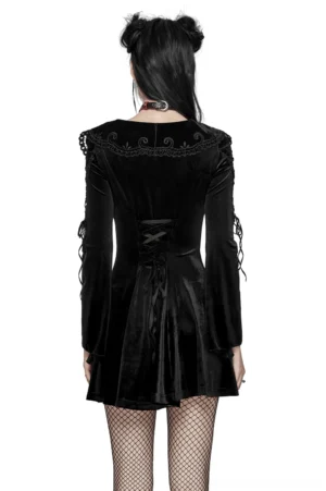 Black velvet gothic dress back view showcasing corset lace-up design and back drawstring, styled with fishnet stockings