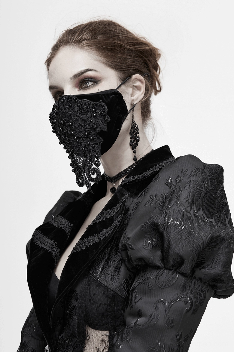 Black velvet gothic lace face mask design detail showing ornate beadwork and appliqué craftsmanship