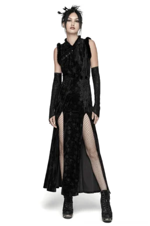 Black velvet gothic maxi dress with fur-trimmed slanted collar, high side slit, and matching damask print arm sleeves - front three-quarter view