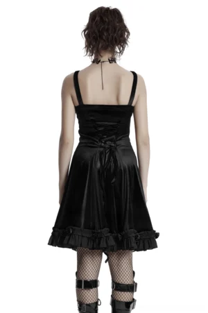 Gothic black velvet slip dress with lace-up back design and ruffled hem - back view on model