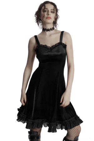 Black velvet gothic slip dress with lace-trimmed sweetheart neckline and ruffled hem - front view on model