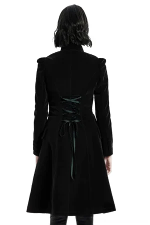 Back view of black velvet gothic trench coat featuring dramatic corset lace-up closure and waist cinching design