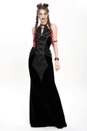 Black velvet halter chain maxi dress front full-body view on model with twin braids, studio white background