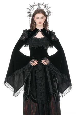 Black velvet lace bell sleeve bolero shrug worn by gothic model with crown headdress, front full body view showcasing dramatic flared sleeves and open-front cape collar design