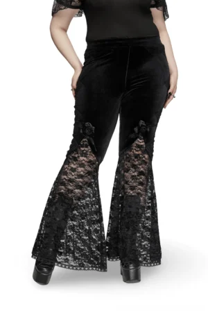 Black velvet flared gothic pants with rose and lace trim, rear three-quarter view on plus-size model