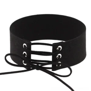 Black velvet lace-up gothic choker necklace with silver eyelet details, front flat lay view