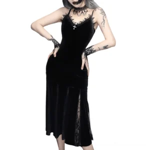 Black velvet mermaid slip dress with lace neckline trim and cross pendant, front three-quarter view on model
