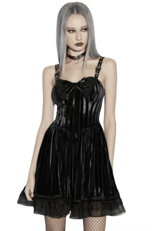 Black velvet striped gothic midi dress with bow brooch worn by model on white background, front view
