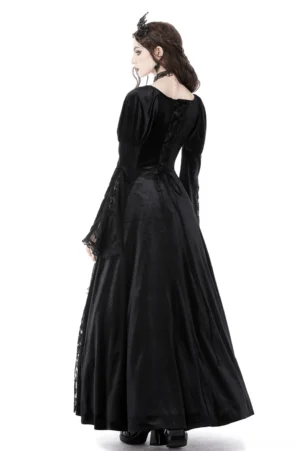 Back view of black gothic evening gown showing crisscross lace-up corset back and floor-length puff sleeves