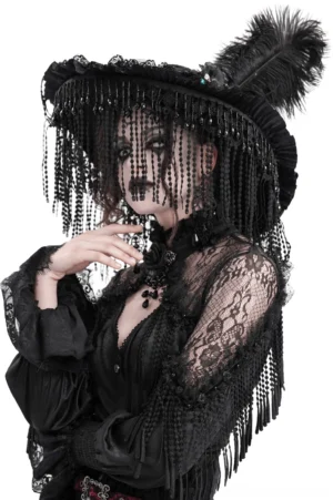 Black Victorian gothic hat with ostrich feather and beaded fringe worn by model in three-quarter view, showing detailed beadwork and lace trim