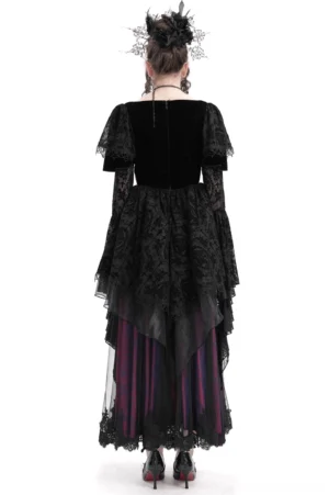 Black gothic lace maxi dress with dramatic ruffled sleeves, scalloped lace hem with beading, lace-up back closure, and velvet upper back panel rear view on model