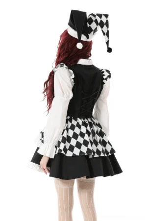 Harlequin gothic dress back view showing corset lacing and puffed sleeves on model