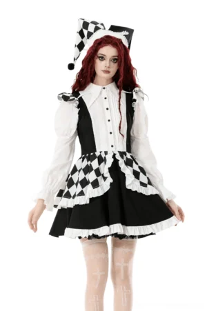 Black and white harlequin gothic ruffle mini dress front view on model with dramatic theatrical styling and checkered pattern