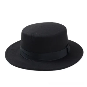 Black wool felt gothic gambler fedora with flat crown and ribbon band, overhead front view