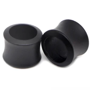 Black wooden ear plugs and tunnel stretchers with hollow double-flared design, displayed on white background