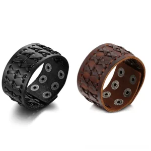 Black leather wrap bracelet side view showing cross-woven surface detail and metal snap fasteners for size adjustment