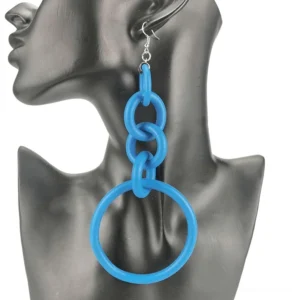 Electric blue neo-gothic silicone drop earrings with linked hoop structure, displayed on black mannequin head