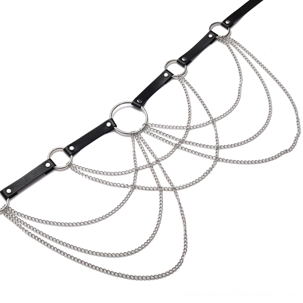 Flat lay product shot showing black leather straps and connected silver chains components with O-ring hardware