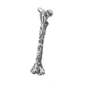 Vintage engraved bone pendant necklace front view showing detailed ornamental design