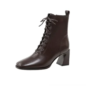 Dark brown lace-up chunky heel gothic ankle boots with matte genuine leather finish, three-quarter front view
