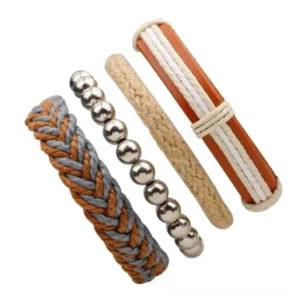 4-piece brown gothic bracelet set flat lay featuring braided leather, woven rope, and metal bead wristbands on white background
