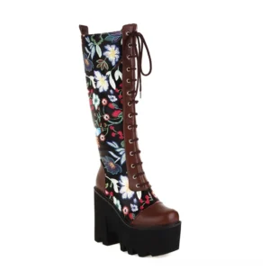 Brown leather panel gothic floral platform knee-high boots with lace-up design and black chunky platform heel