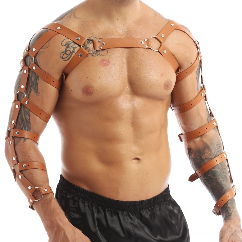 Brown leather chest harness on tattooed muscular male model, front-facing studio photography