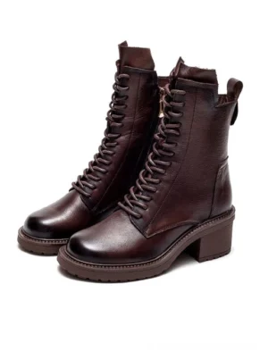 Brown gothic leather ankle combat boots with lace-up closure and vintage patina finish, front view