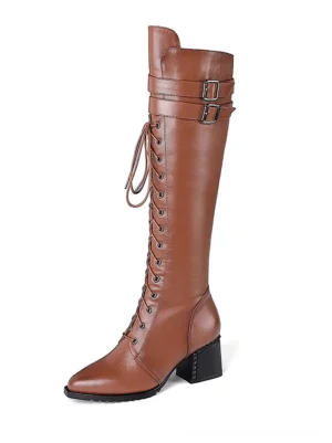 Brown genuine leather gothic boots with square block heel and decorative buckle strap details, side view