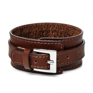 Brown leather gothic wristband with adjustable strap, double-layer construction with contrast stitching and fuzzy inner lining, silver metal buckle