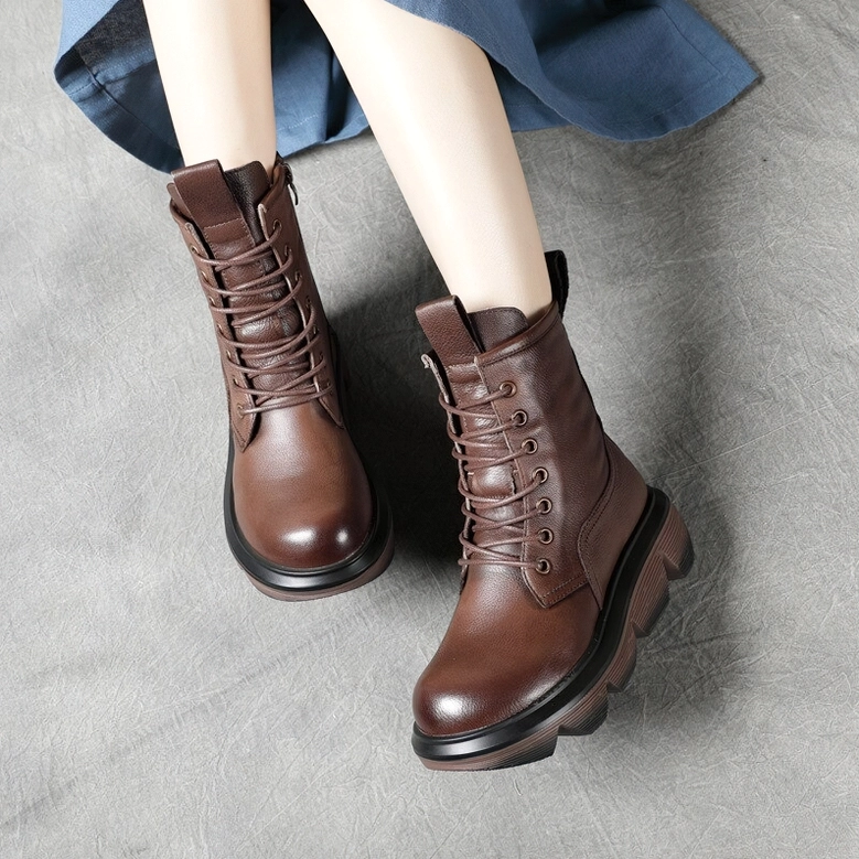 Brown leather gothic platform combat boots front side view, vintage finish with thick anti-slip sole