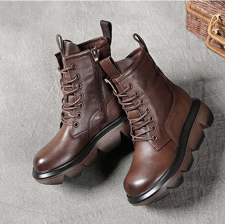 Brown gothic platform combat boots detailed view of round toe and platform construction