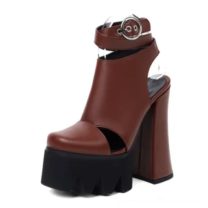 Brown gothic platform sandals with chunky square heel and buckle closure, studio shot