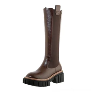 Brown leather Chelsea gothic platform boots with contrast sole stitching and elastic side panels, side angle view