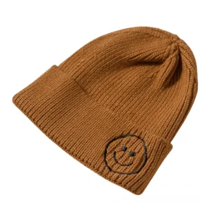 Brown smiley face knit beanie with solid brown embroidered smiley, dark gothic winter hat side view