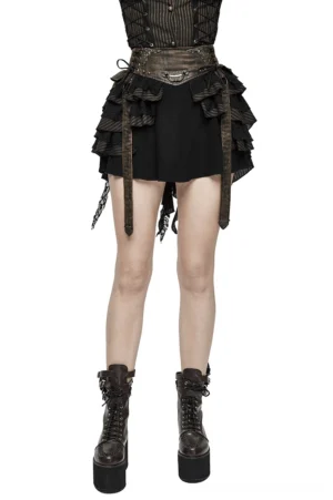 Women's brown steampunk mini skirt with faux leather straps and ruffled layers, front full view on model