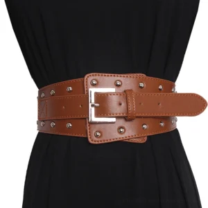 Brown wide leather studded corset belt for women featuring square metal buckle and decorative rivets on mannequin