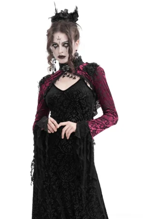 Burgundy gothic lace bolero with victorian bell sleeves worn by model, front three-quarter view showcasing lace-trimmed flared sleeves and damask floral pattern