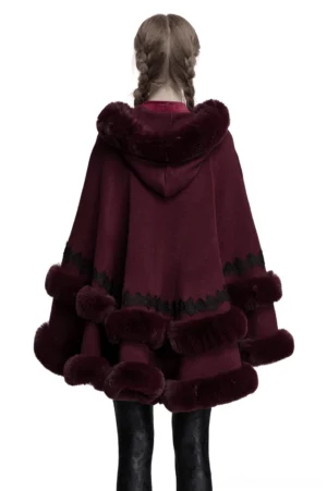 Back view of burgundy hooded cloak showing layered faux fur pom-pom trims and hood detail