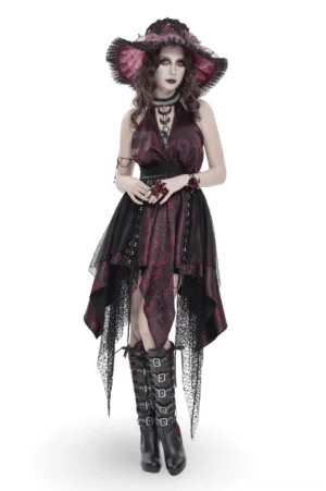 Burgundy halter gothic dress with black lace layers, asymmetric hem, and chain collar detail - front full-body view on model wearing feather hat and gothic accessories
