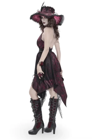 Open back gothic halter dress showing corset-style lacing and layered tulle skirt - side profile view with model in black platform boots
